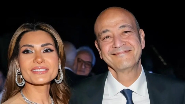 عمرو أديب ودينا طلعت 